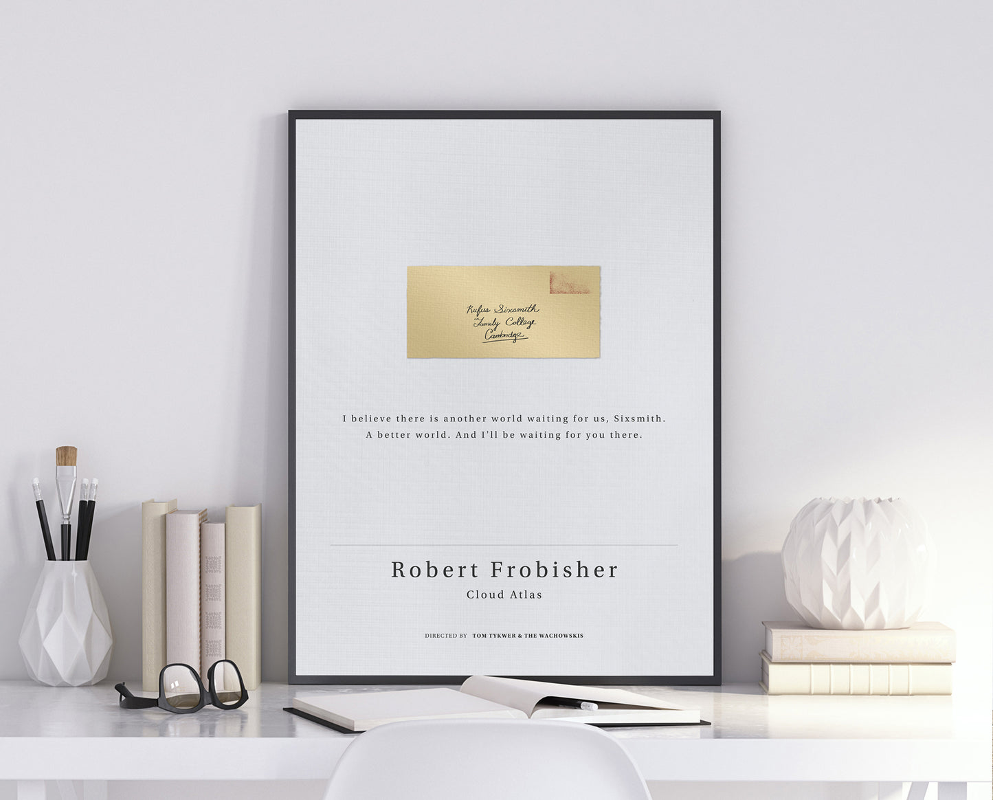Cloud Atlas movie quote digital poster featuring Robert Frobisher’s quote "I believe there is another world waiting for us, Sixsmith. A better world. And I'll be waiting for you there." on an off-white background with an art design of an old letter addressed to Rufus Sixsmith.