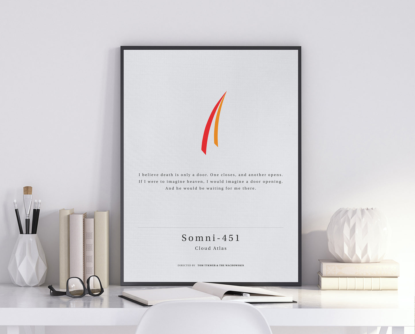 Cloud Atlas movie quote digital poster featuring Doona Bae’s quote "I believe death is only a door. One closes, and another opens. If I were to imagine heaven, I would imagine a door opening. And he would be waiting for me there." on an off-white background with an art design Somni-451’s iconic hair stripe.