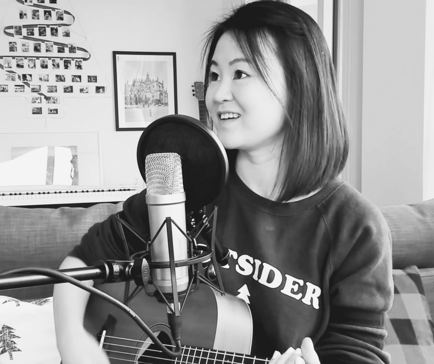 Image of author Viola Hernandez playing guitar