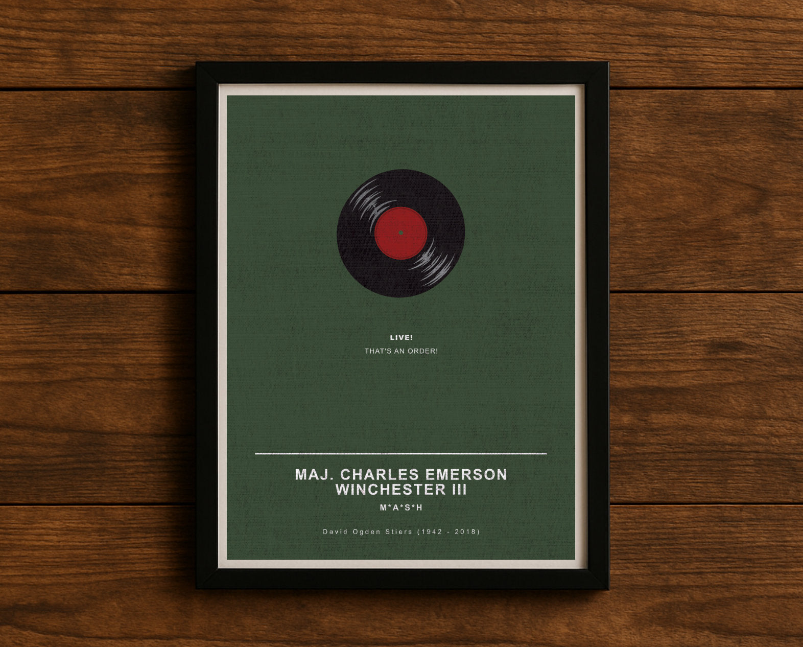 MASH TV series quote digital poster titled "Maj. Charles Emerson Winchester III" featuring his quote "Live! That's an order!" on an army green textured background with an art design of Winchester’s vinyl record.